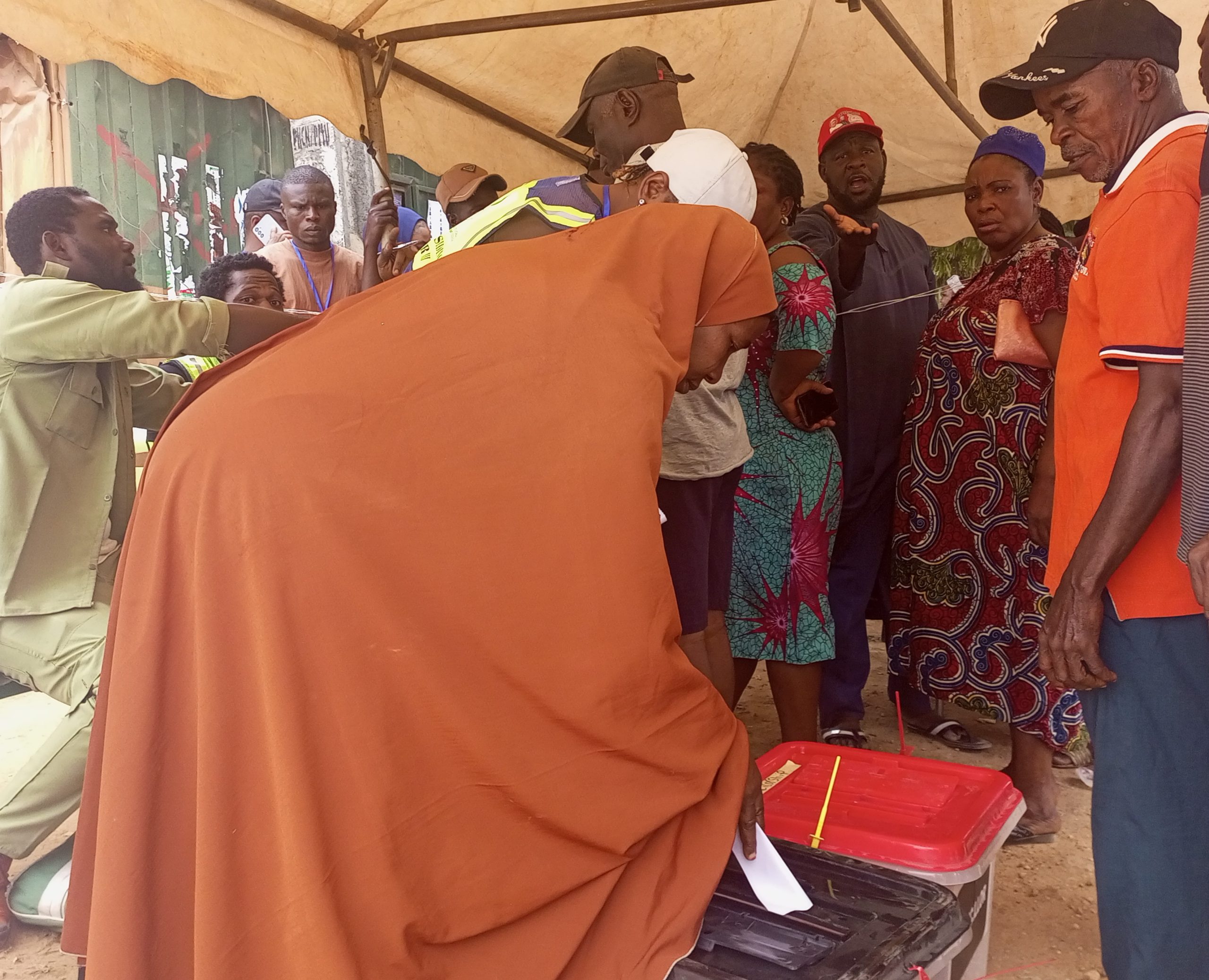 Voter casting ballot